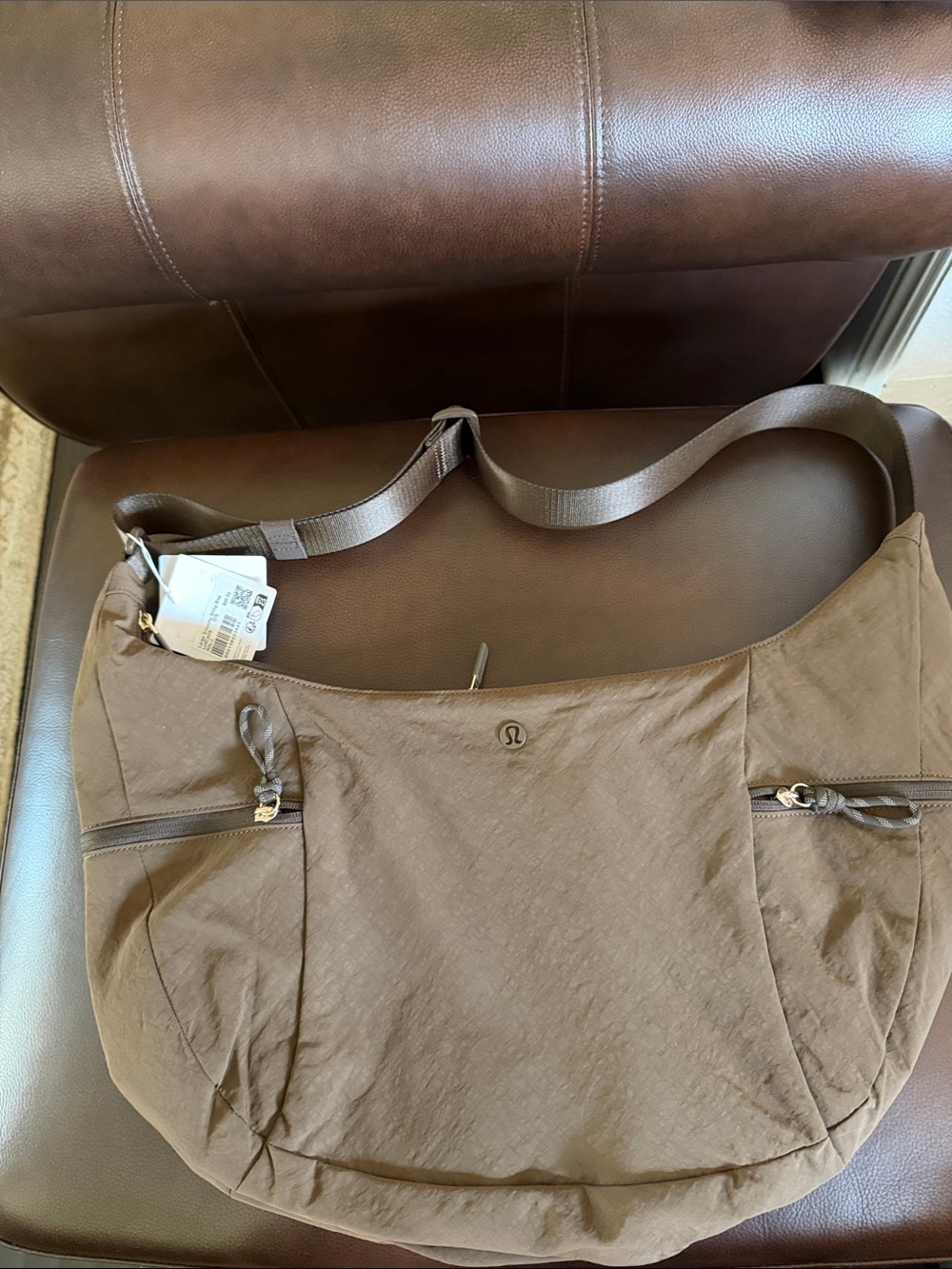 lululemon athletica Large Slouchy Sling Bag in Brown